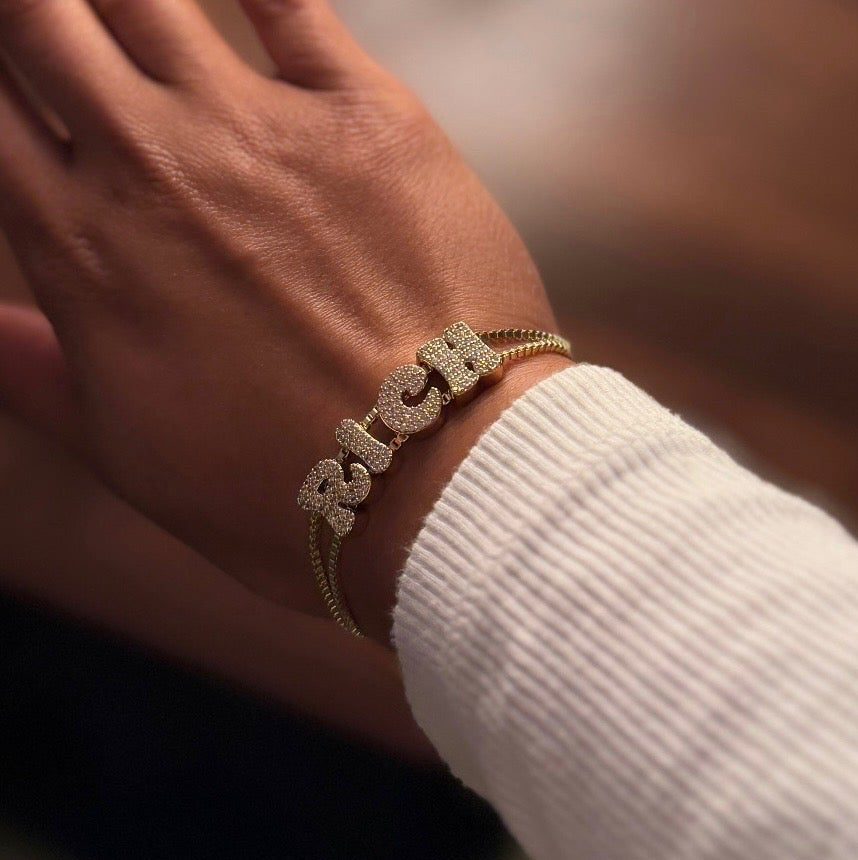 Immigrati ricchi - Bracciale unisex RICH
